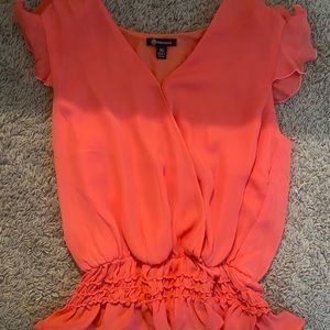 Cute coral ruffle top!